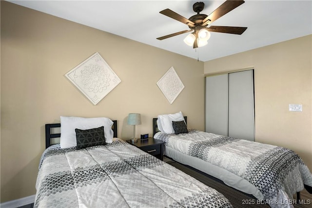 112 Waters Edge Ct Unit 2A, Lake Ozark, MO 65049 - bedroom with a closet and ceiling fan