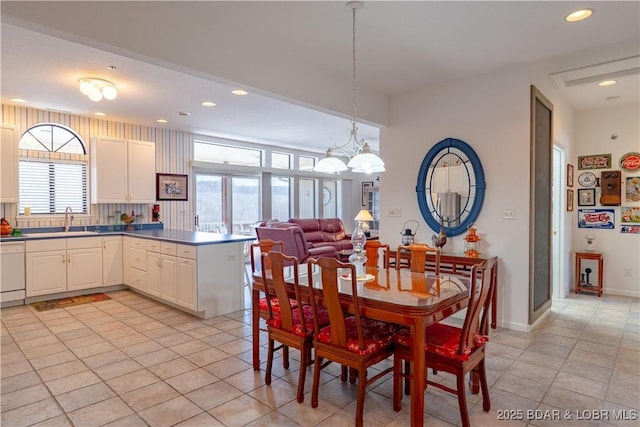 611 Lazy Days Rd Unit L6, Osage Beach, MO 65065 - dining space featuring light tile patterned flooring, recessed lighting, and a chandelier