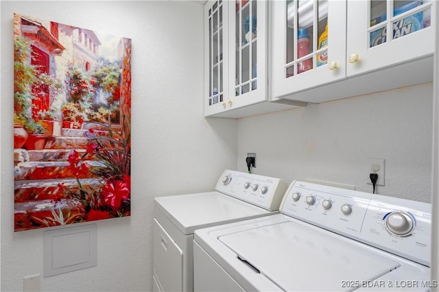611 Lazy Days Rd Unit L6, Osage Beach, MO 65065 - clothes washing area with washer and clothes dryer and cabinet space