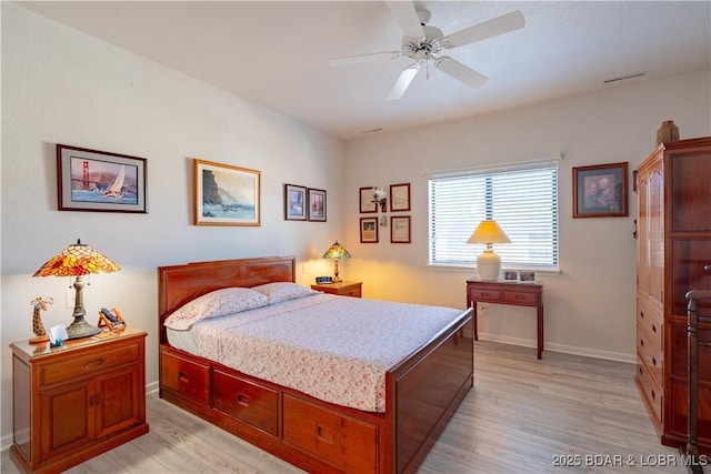 611 Lazy Days Rd Unit L6, Osage Beach, MO 65065 - bedroom featuring light wood finished floors, baseboards, and a ceiling fan