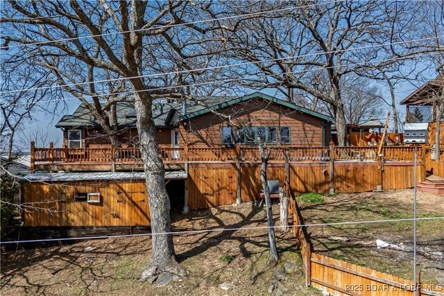 24 Arrowhead Beach Rd, Lake Ozark, MO 65049 - back of house with a wooden deck