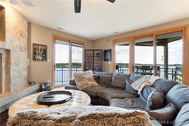 4465 Hamrock Ln Unit 502, Osage Beach, MO 65065 - living area with visible vents and a ceiling fan
