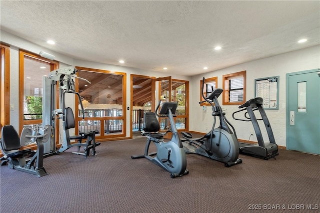 4465 Hamrock Ln Unit 502, Osage Beach, MO 65065 - exercise room with a textured ceiling and recessed lighting