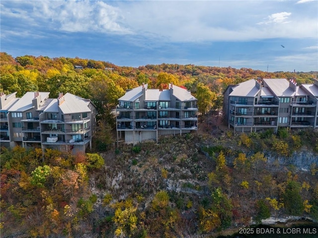 4465 Hamrock Ln Unit 502, Osage Beach, MO 65065 - drone / aerial view featuring a forest view