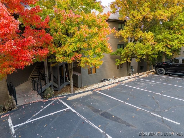 4465 Hamrock Ln Unit 502, Osage Beach, MO 65065 - uncovered parking lot with stairway