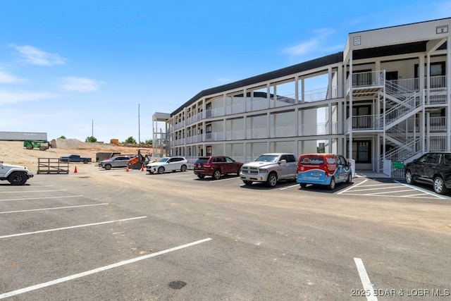 1045 Topsider Ln Unit 113, Osage Beach, MO 65065 - view of property featuring uncovered parking