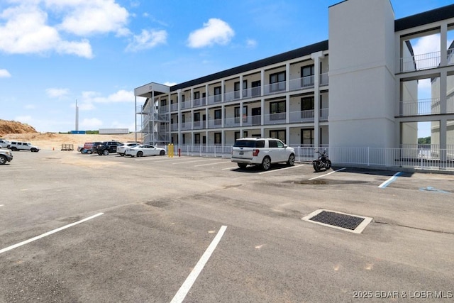 1045 Topsider Ln Unit 113, Osage Beach, MO 65065 - view of property featuring uncovered parking