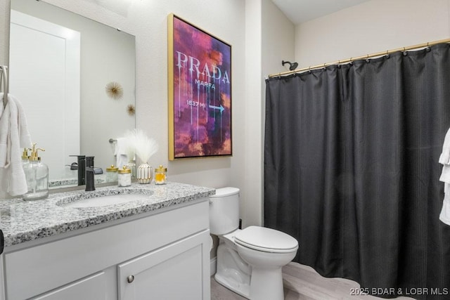 1045 Topsider Ln Unit 113, Osage Beach, MO 65065 - full bathroom with vanity, toilet, and a shower with shower curtain