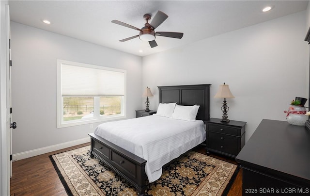 bedroom featuring baseboards, dark wood-style flooring, and recessed lighting