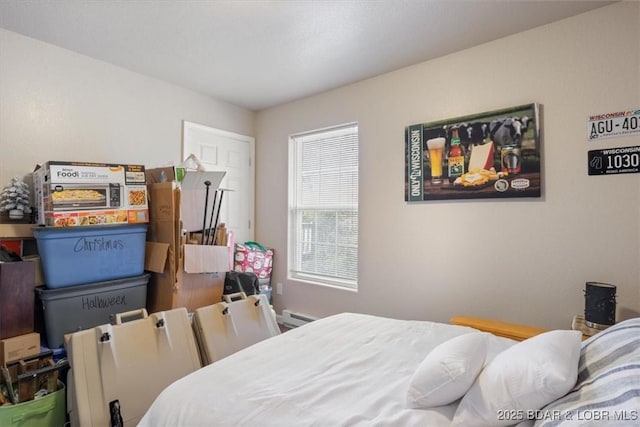 145 Oak Bnd, Kaiser, MO 65047 - bedroom featuring a baseboard heating unit