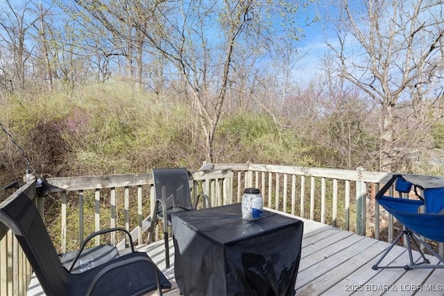 145 Oak Bnd, Kaiser, MO 65047 - deck with outdoor dining area
