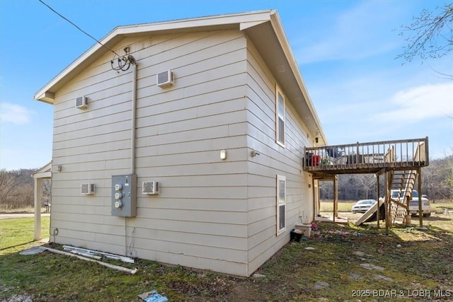 145 Oak Bnd, Kaiser, MO 65047 - view of side of home with a wooden deck