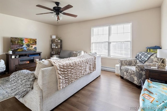145 Oak Bnd, Kaiser, MO 65047 - living room with a baseboard radiator, ceiling fan, and wood finished floors