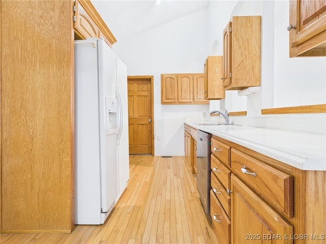 3760 Dogwood Dr, Stover, MO 65078 - kitchen with a sink, light wood-type flooring, white fridge with ice dispenser, dishwasher, and light countertops