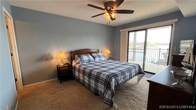 31347 Northshore Dr Unit 101A, Rocky Mount, MO 65072 - bedroom with baseboards, carpet floors, access to exterior, and a ceiling fan