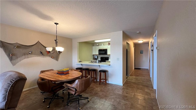 31347 Northshore Dr Unit 101A, Rocky Mount, MO 65072 - dining room featuring baseboards, a textured ceiling, and a notable chandelier