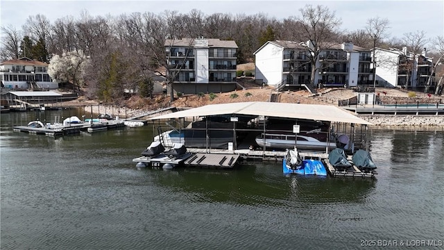 31347 Northshore Dr Unit 101A, Rocky Mount, MO 65072 - view of dock with boat lift and a water view