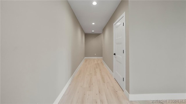 20311 Timberlake Village Ln, Rocky Mount, MO 65072 - hall featuring light wood finished floors, baseboards, and recessed lighting