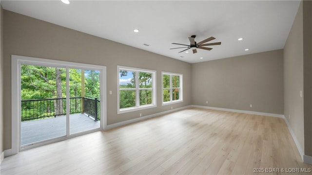 20311 Timberlake Village Ln, Rocky Mount, MO 65072 - spare room featuring plenty of natural light, ceiling fan, and recessed lighting