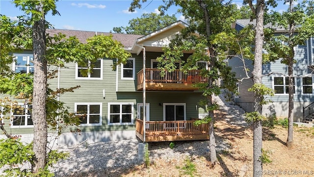 20311 Timberlake Village Ln, Rocky Mount, MO 65072 - back of property featuring a balcony and roof with shingles