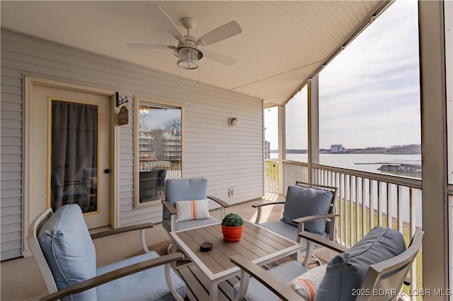 398 Regatta Bay Dr Unit 1A, Lake Ozark, MO 65049 - sunroom with ceiling fan and a water view