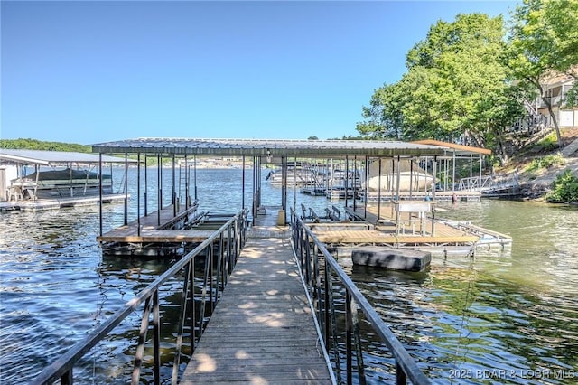 27394 Cross Ln, Barnett, MO 65011 - dock area featuring a water view and boat lift