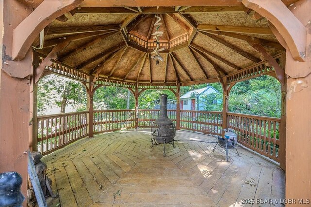 27394 Cross Ln, Barnett, MO 65011 - wooden terrace featuring a gazebo and a storage unit