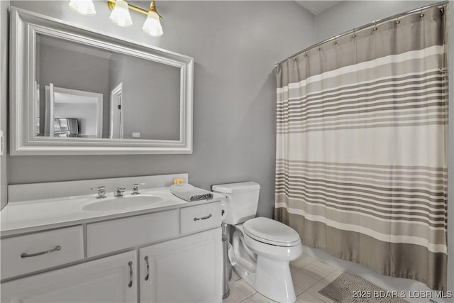 full bath with tile patterned flooring, vanity, toilet, and a shower with curtain