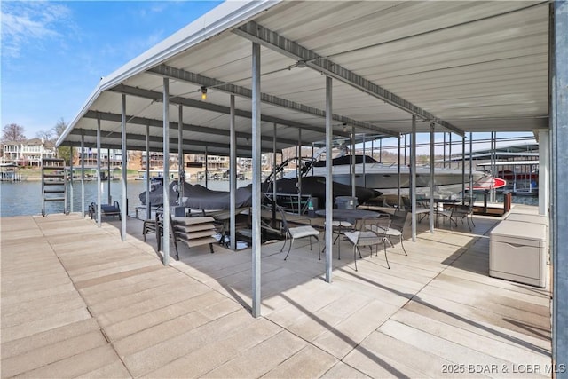 dock area featuring a water view and boat lift