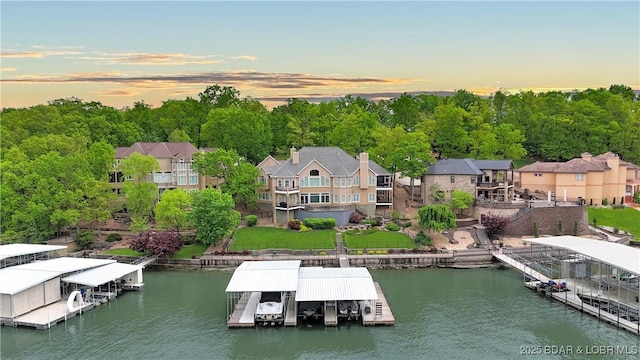 dock with a water view and boat lift