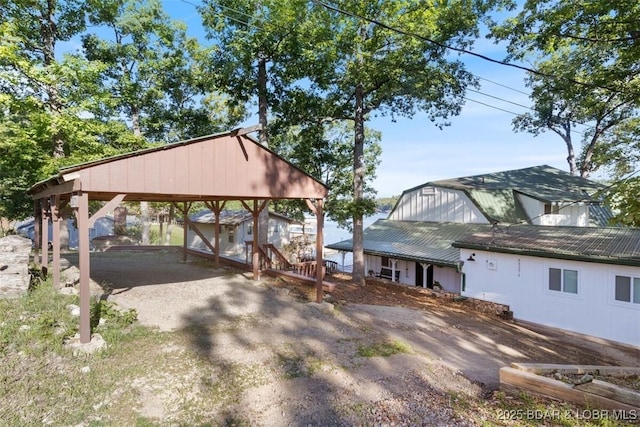 33271 Elaine Rd, Sunrise Beach, MO 65079 - exterior space with metal roof and a carport