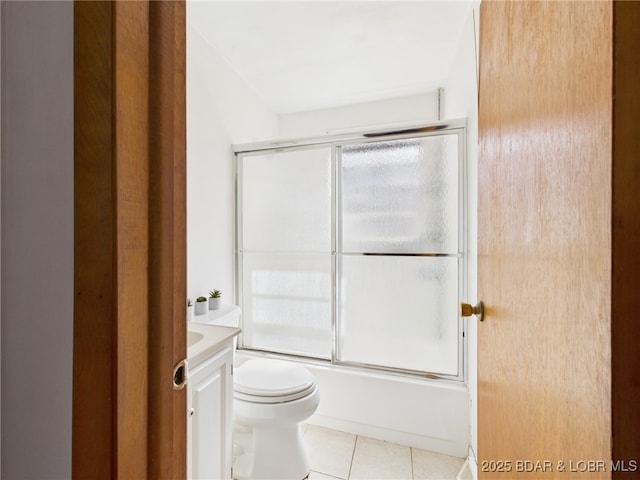 1052 Diggs Rd, Osage Beach, MO 65065 - full bathroom with tile patterned flooring, toilet, vanity, and enclosed tub / shower combo