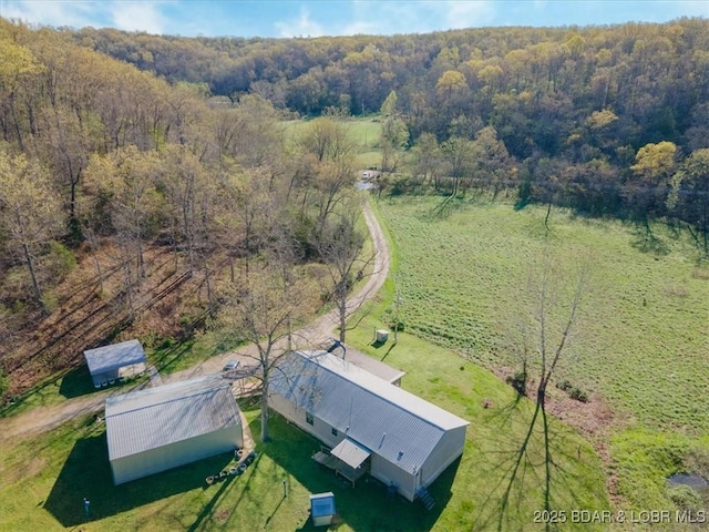 aerial view featuring a forest view