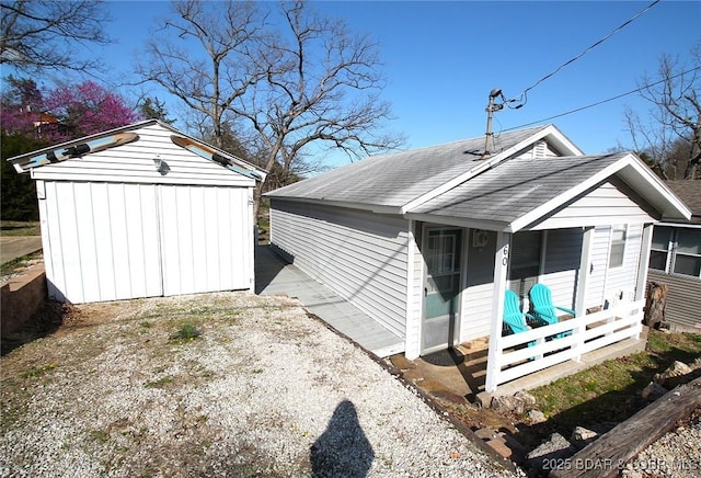 exterior space with an outbuilding