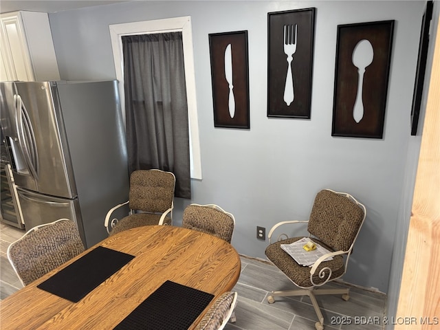 1265 Lick Creek Rd, Edwards, MO 65326 - dining area featuring wood finished floors