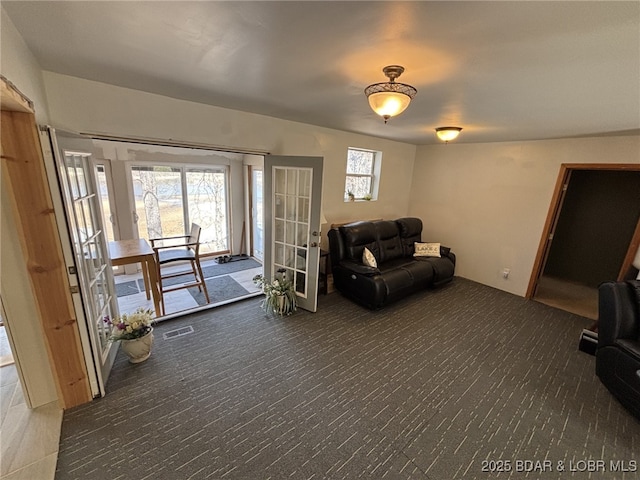 1265 Lick Creek Rd, Edwards, MO 65326 - living room with carpet flooring and french doors