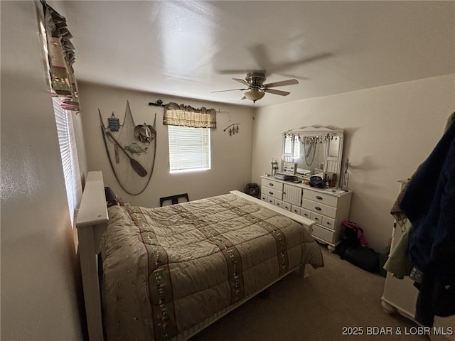 1265 Lick Creek Rd, Edwards, MO 65326 - carpeted bedroom featuring ceiling fan