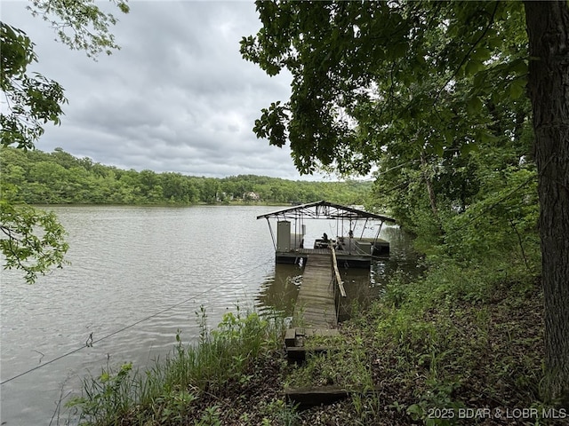 1265 Lick Creek Rd, Edwards, MO 65326 - dock with a wooded view and a water view