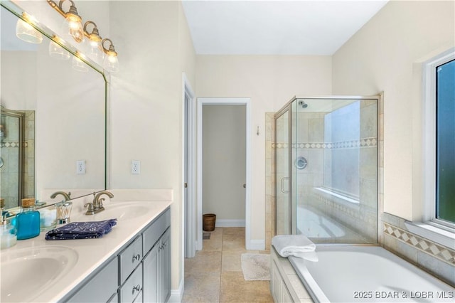 1392 Robyn Ct, Osage Beach, MO 65065 - full bathroom with a shower stall, double vanity, a garden tub, and tile patterned flooring