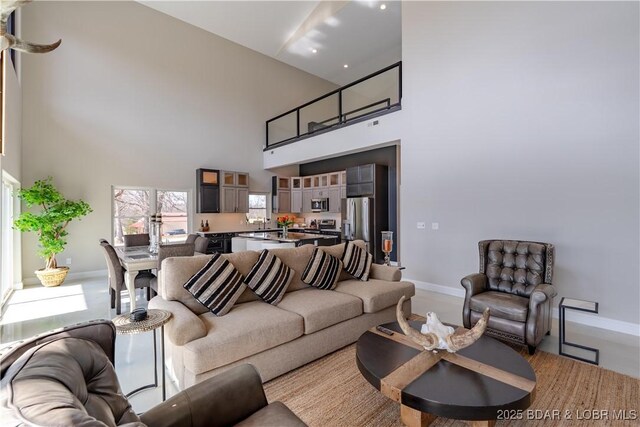 TBD Willow Rd, Eldon, MO 65026 - living area with a high ceiling and baseboards