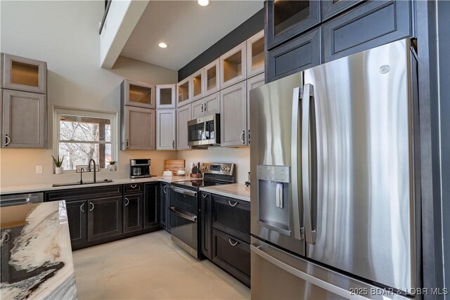 TBD Willow Rd, Eldon, MO 65026 - kitchen featuring stainless steel appliances, recessed lighting, and glass insert cabinets