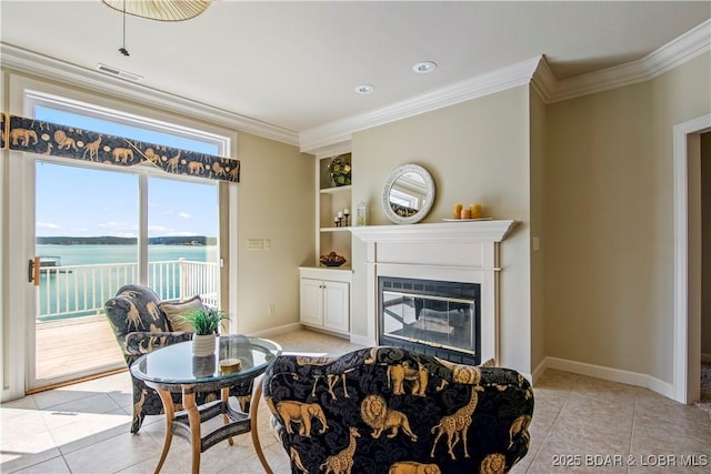 1065 Imperial Point Dr, Four Seasons, MO 65049 - living area featuring ornamental molding, light tile patterned floors, a glass covered fireplace, a water view, and built in shelves