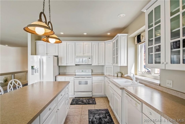 1065 Imperial Point Dr, Four Seasons, MO 65049 - kitchen featuring white appliances, recessed lighting, white cabinets, and light tile patterned flooring