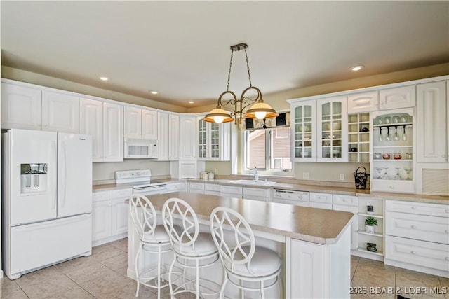1065 Imperial Point Dr, Four Seasons, MO 65049 - kitchen featuring white appliances, light tile patterned flooring, white cabinetry, and recessed lighting