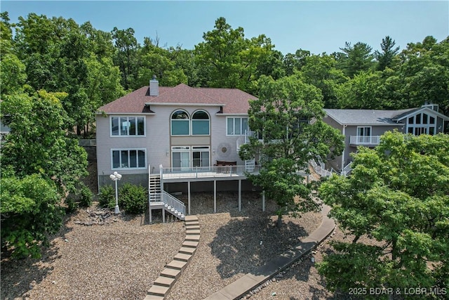 1065 Imperial Point Dr, Four Seasons, MO 65049 - back of property with stairway, a chimney, and a shingled roof