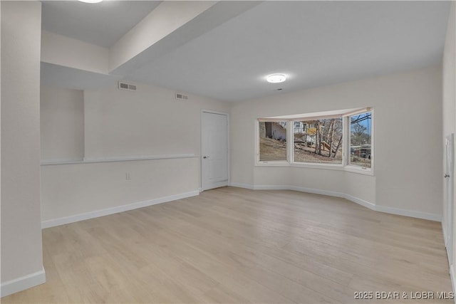 1293 Ginger Rd, Lake Ozark, MO 65049 - empty room with baseboards, light wood-type flooring, and visible vents