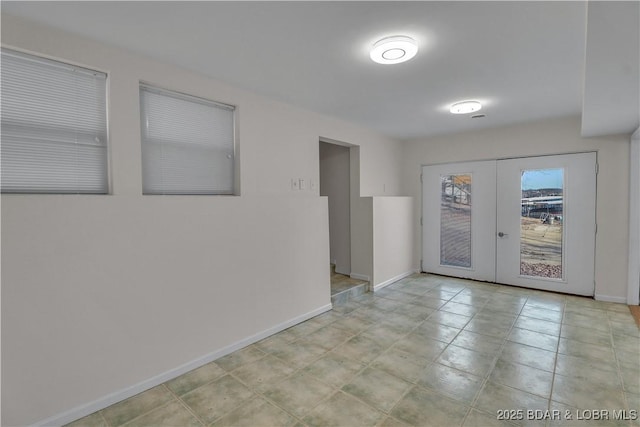 1293 Ginger Rd, Lake Ozark, MO 65049 - empty room with baseboards and french doors