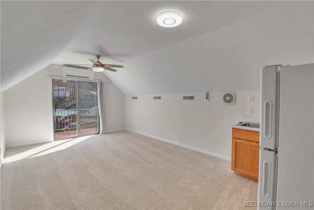 1293 Ginger Rd, Lake Ozark, MO 65049 - bonus room featuring a ceiling fan, lofted ceiling, a wall mounted air conditioner, visible vents, and light carpet