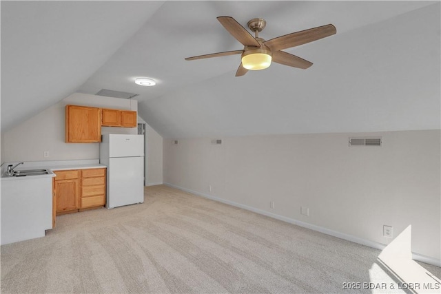 1293 Ginger Rd, Lake Ozark, MO 65049 - additional living space featuring lofted ceiling, a sink, visible vents, and light colored carpet