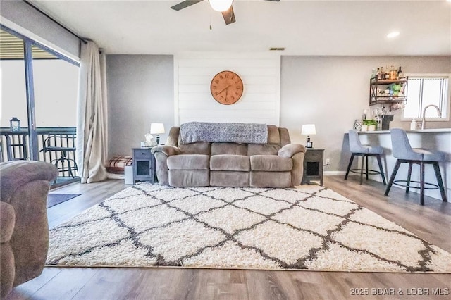 2500 Bay Point Ln Unit 135, Osage Beach, MO 65065 - living room with wood finished floors, a ceiling fan, visible vents, and recessed lighting